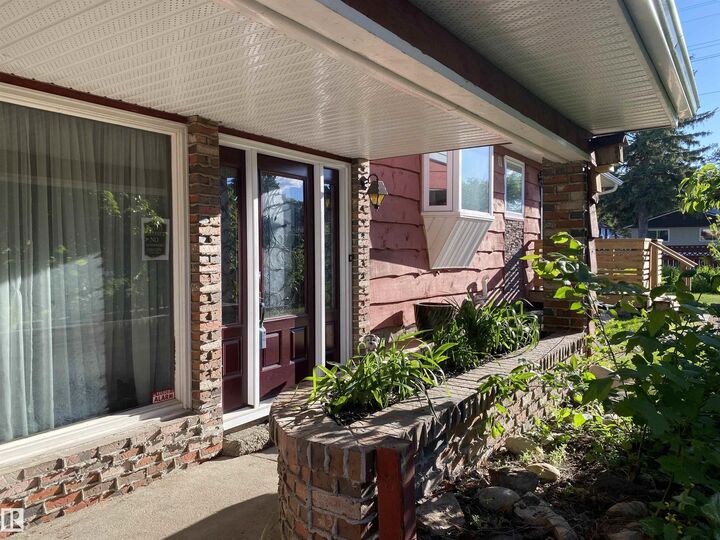 Property Photo: 12137 50 Street NW AB T5W 3C6