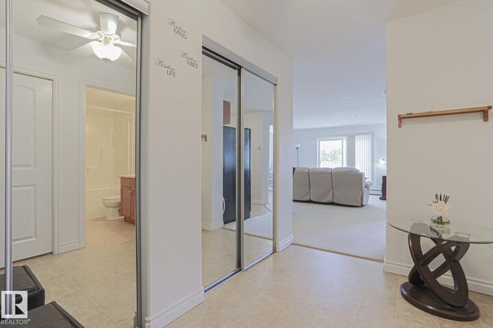Property Photo:  50 Woodsmere 237  AB T8L 4N9 
