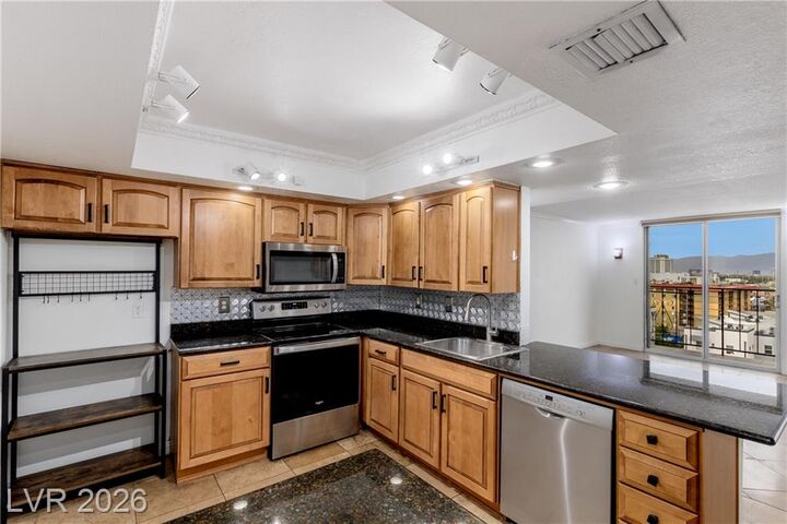 Property Photo:  3930 University Center Drive 1001  NV 89119 