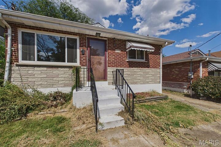 Property Photo:  113 E Cartwright Avenue  MO 63125 