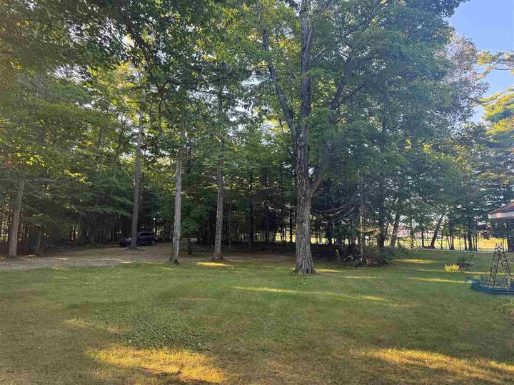 Property Photo:  Vl .65 Ac Ridge  MI 49701 