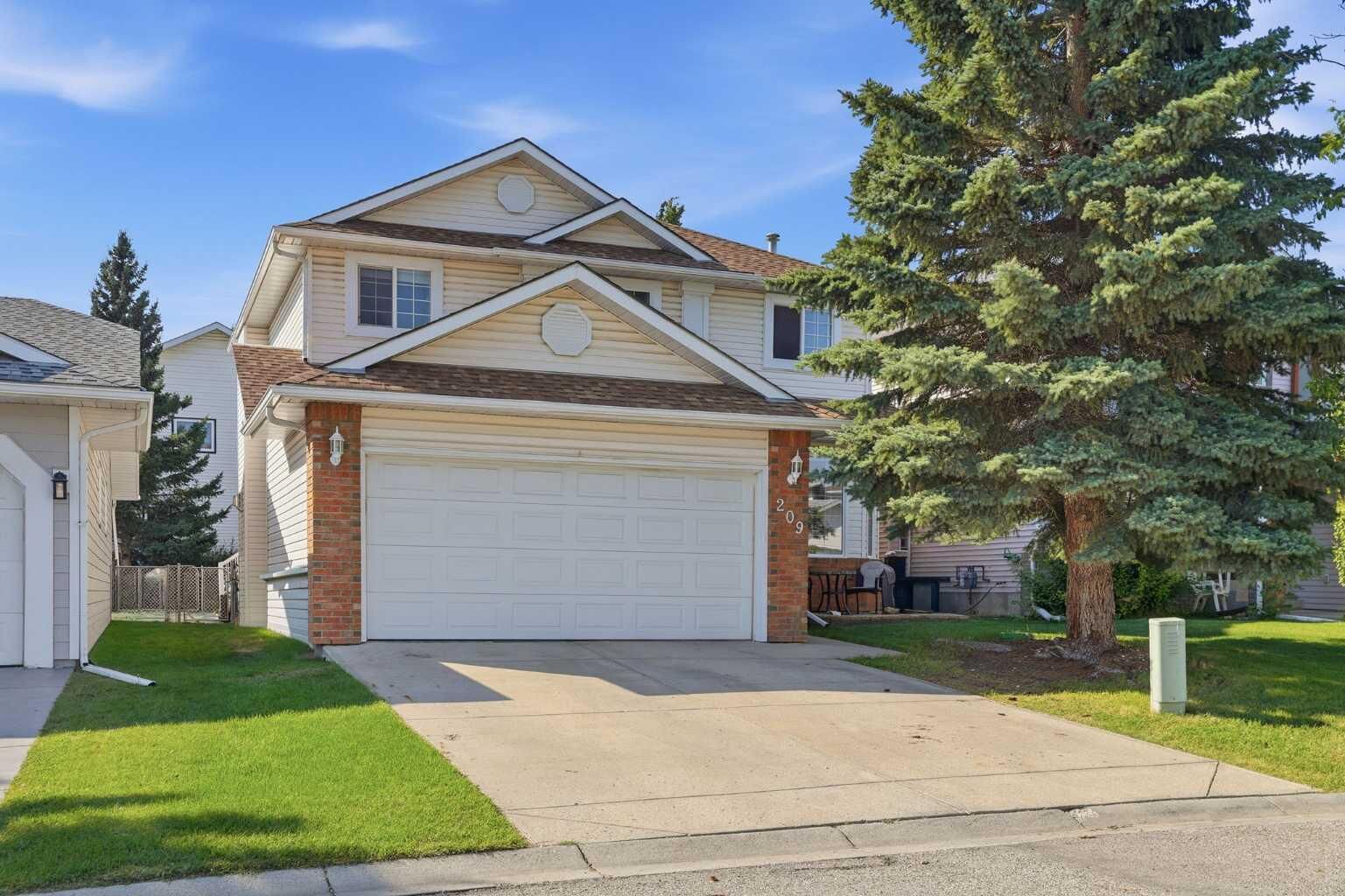 Property Photo:  209 Schubert Place NW  AB T3L 1W6 