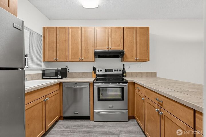 Property Photo:  14445 NE 40th Street D101  WA 98007 