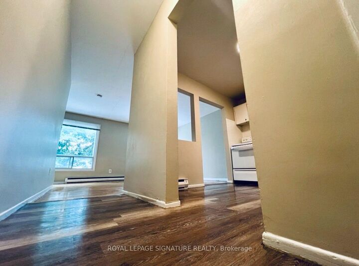 Property Photo:  2203 Danforth Avenue A  ON M4C 1K4 