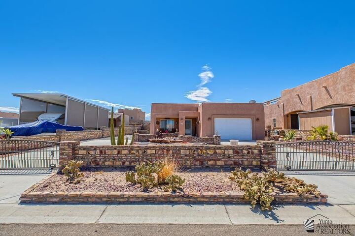 Property Photo:  12597 E 46 Dr  AZ 85367 