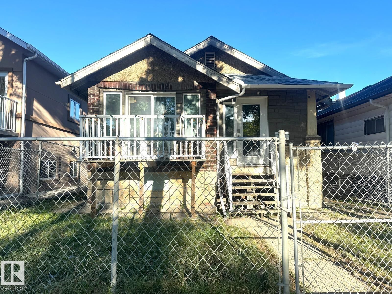 Property Photo:  11323 97 Street NW  AB T5G 1X3 