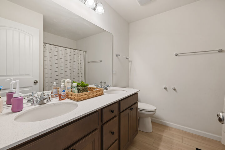 A double vanity in the hall bath.