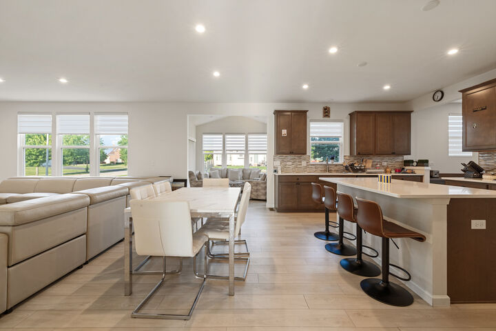 Kitchen and eating area, with the sunroom straight ahead.