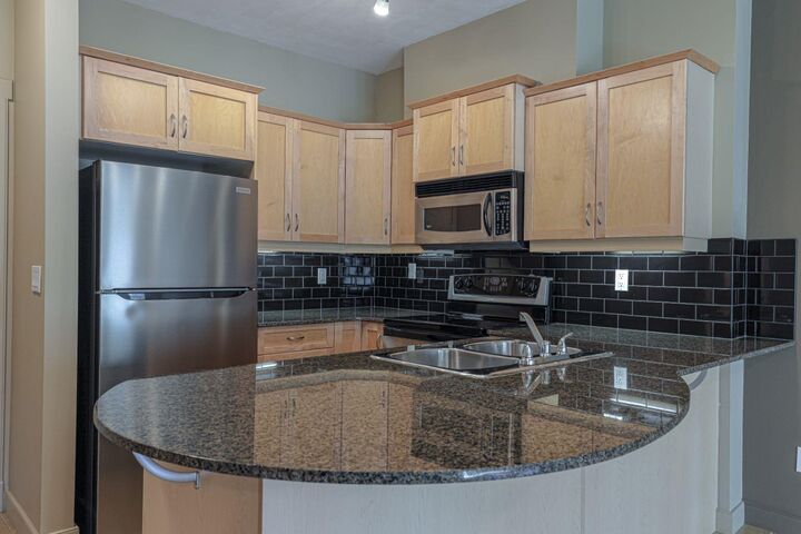 Photo de la propriété: 11811 Lake Fraser Drive SE 1305 AB T2J 7J1