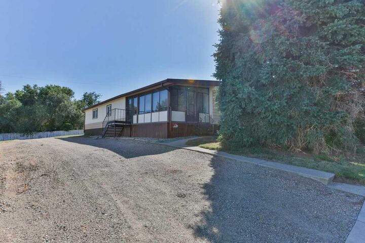 Property Photo:  204 1 Street N  AB T0L 1G0 
