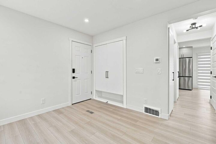 Property Photo:  62 Deer Ridge Way SE  AB T2J 5Y6 