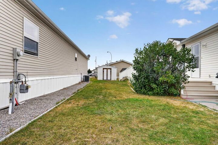 Property Photo:  311 Rodeo Drive  AB T0L 0Z0 