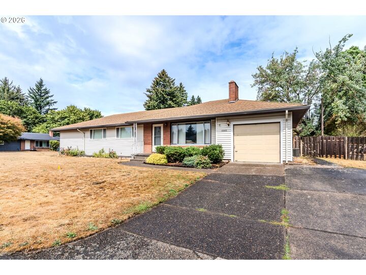 Property Photo:  16005 SE Taggart St  OR 97236 