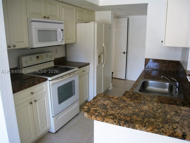 Property Photo:  21000 SW 87th Ave 101  FL 33189 