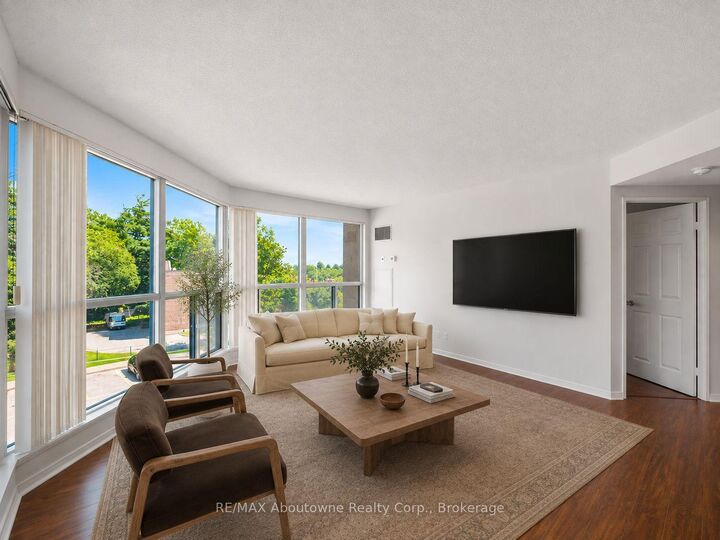 Property Photo:  2177 Burnhamthorpe Road W 309  ON L5L 5P9 