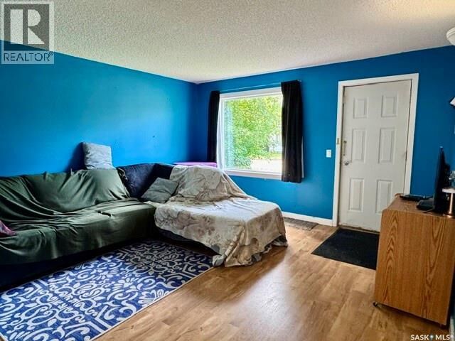 Property Photo: 102 1st Street SW SK S0K 4V0