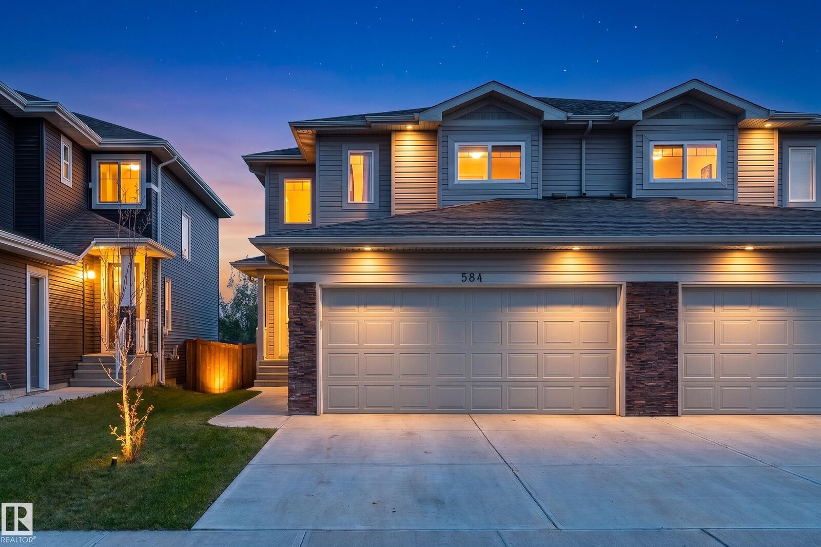 Property Photo:  584 Meadowview Drive  AB T8L 0X1 