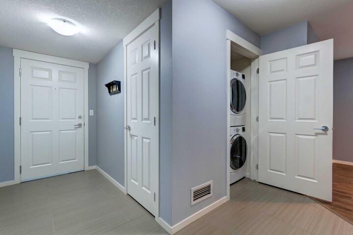 Property Photo:  755 Copperpond Boulevard SE 2114  AB T2Z 4R2 