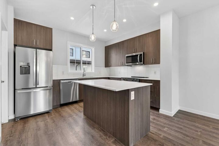 Property Photo:  1750 Rangeview Drive SE 205  AB T3S 0X3 
