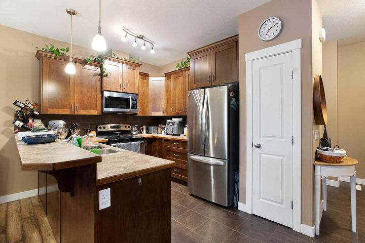 Property Photo:  317 Ranch Ridge Meadow N  AB T1P 0A9 