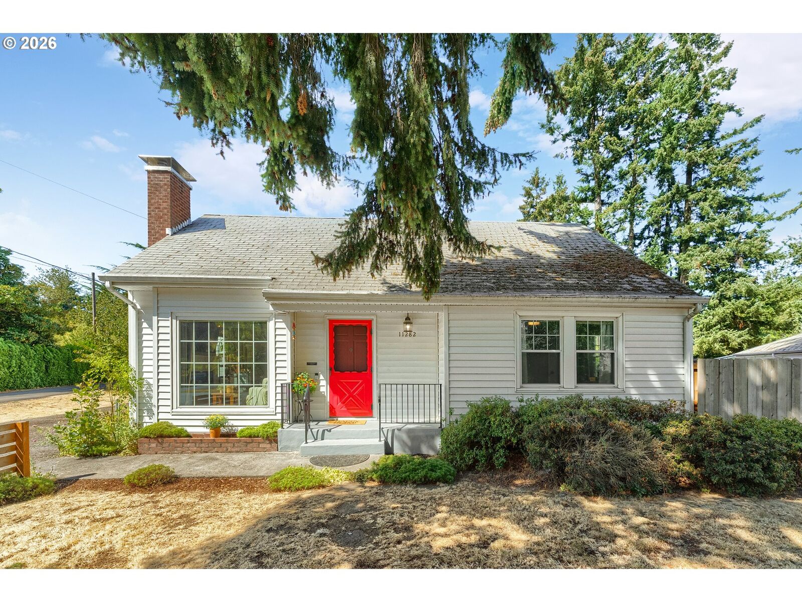 Property Photo:  11282 SE Pine Ct  OR 97216 