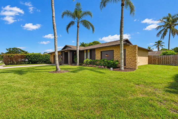 Property Photo:  1058 Fernlea Drive  FL 33417 