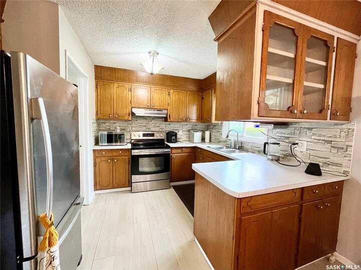 Property Photo:  10 Mackie Crescent  SK S7L 3V3 