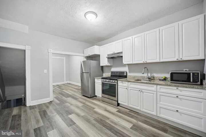 Property Photo:  1524 E 28th Street E  MD 21218 