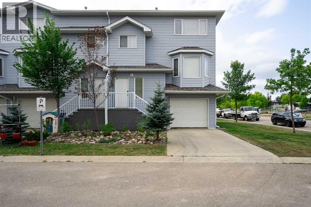 Property Photo:  104 Loutit Road  AB T9K 0A2 