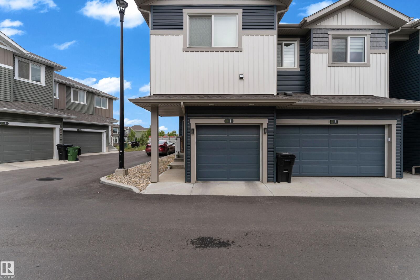 Property Photo:  603 Orchards Boulevard SW 4  AB T6X 2W8 