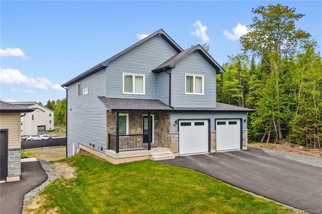 Property Photo:  63 Winterberry Drive  NB E3C 0M3 