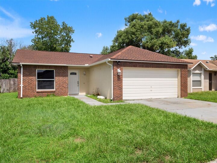 Property Photo:  8937 Valencia Gardens Drive  FL 32825 