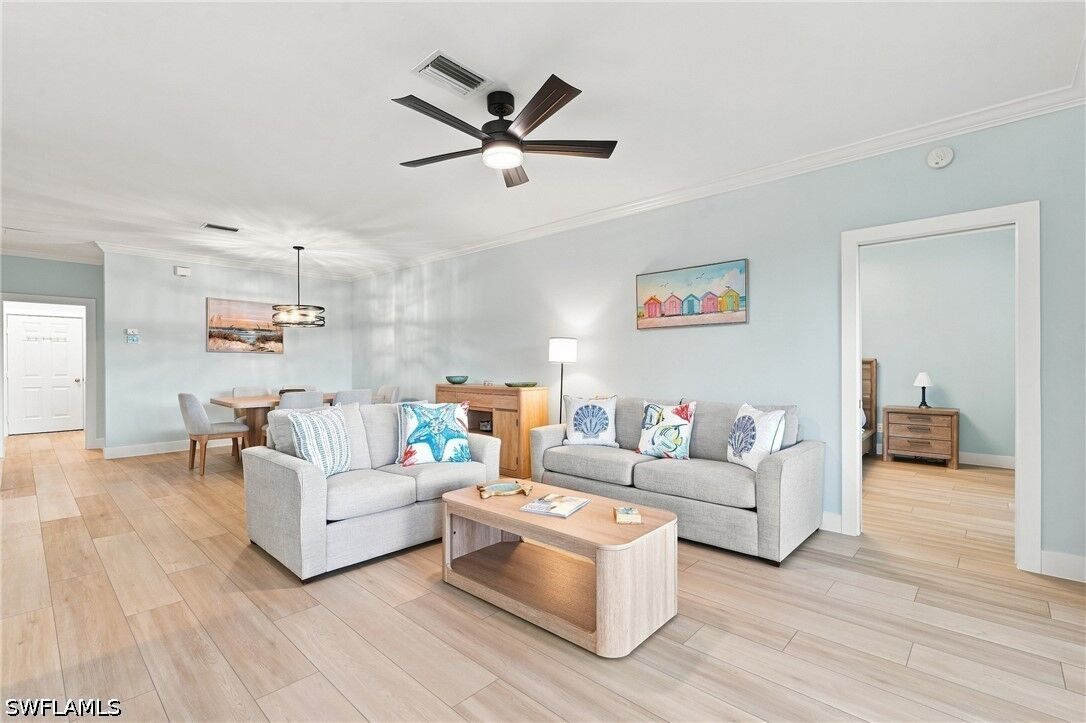 Property Photo: 5877 Three Iron Drive 702 FL 34110