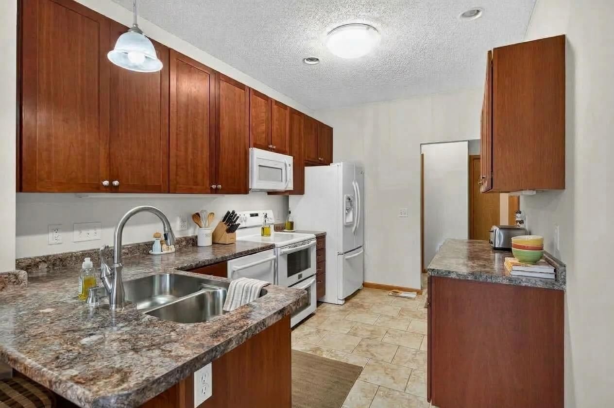 Property Photo:  8600 Tessman Circle N  MN 55445 