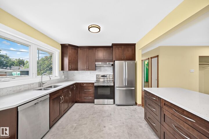 Property Photo:  7032 81 Street NW  AB T6C 2T4 