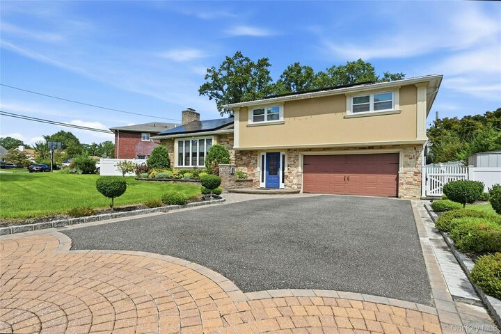 Property Photo: 2 Peppermill Road NY 11576