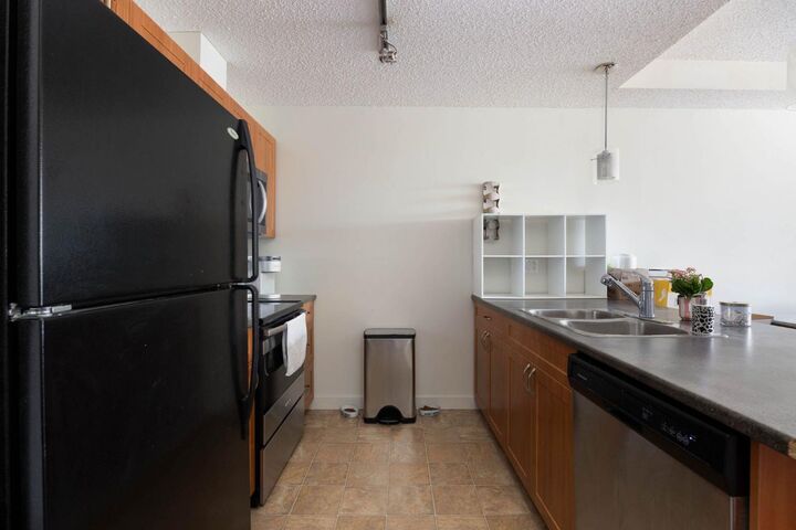 Property Photo:  136A Sandpiper Road 211  AB T9K 0J7 