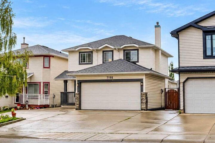 Property Photo:  7198 Laguna Way NE  AB T1Y 7B4 