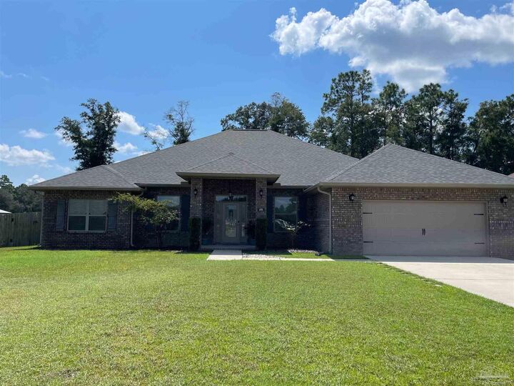 Property Photo:  6506 Cedar Key Dr  FL 32570 