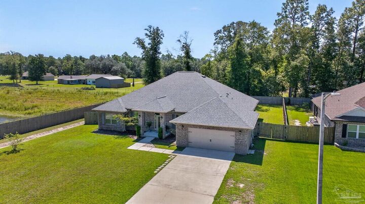 Property Photo: 6506 Cedar Key Dr FL 32570