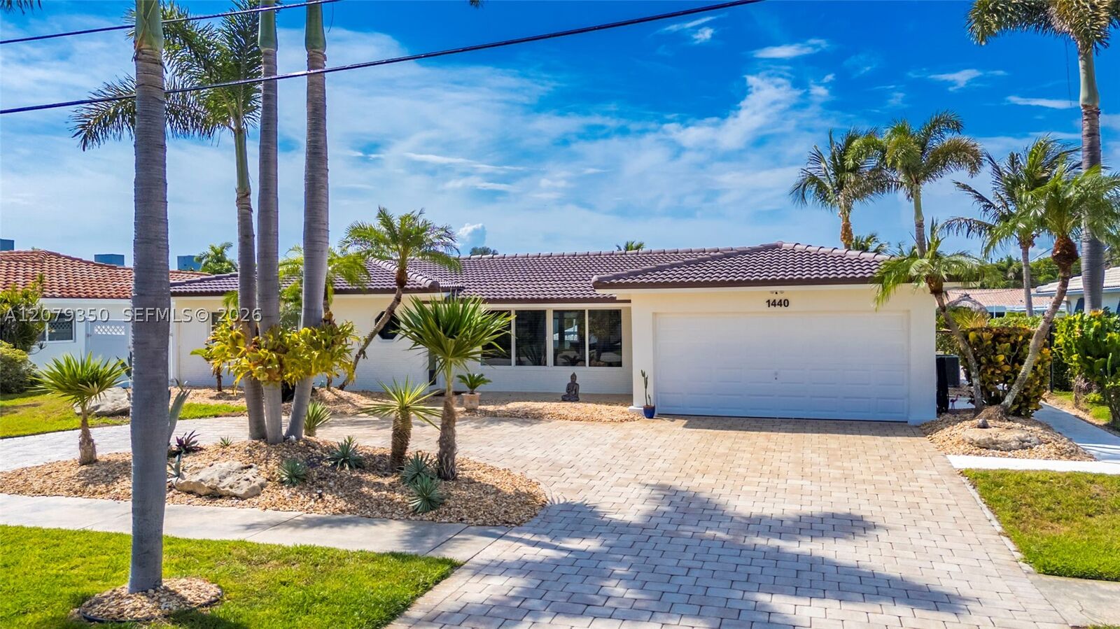 Property Photo:  1440 SE 14th Dr  FL 33441 