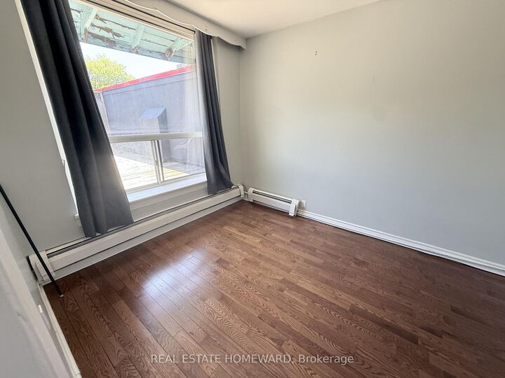 Property Photo:  611 Danforth Avenue Apt 2  ON M4K 1R2 