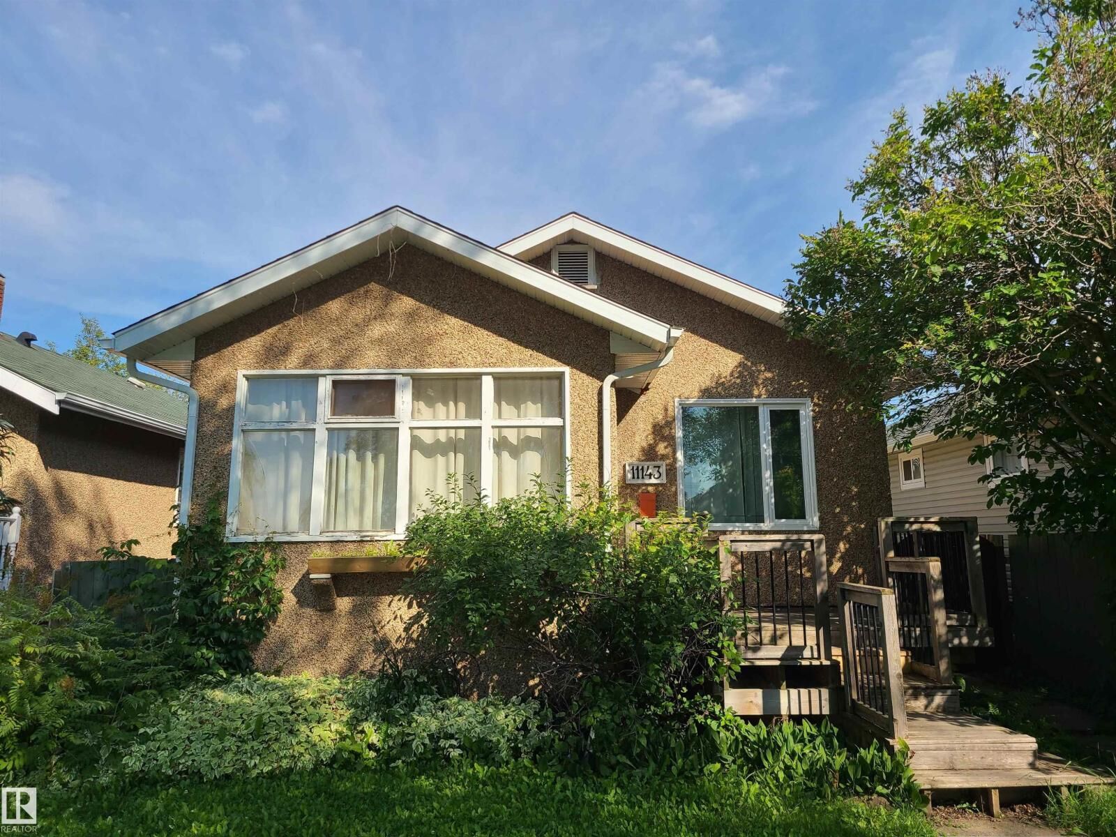 Property Photo: 11143 127 St NW AB T5M 0T5