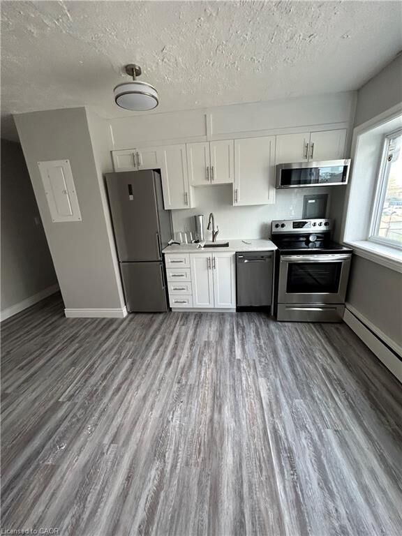 Property Photo:  385 Melvin Avenue 205  ON L8H 2K6 