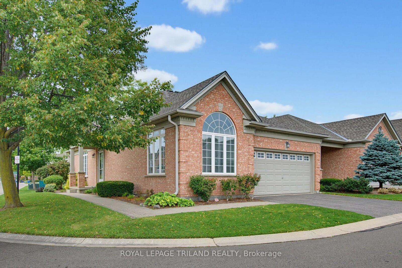 Property Photo: 2025 Meadowgate Boulevard 233 ON N6K 1M9