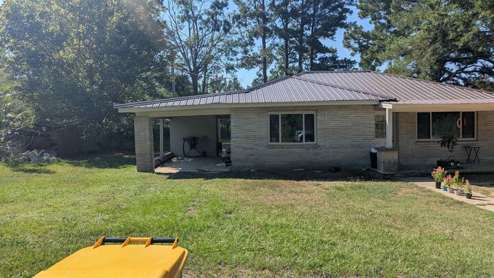 Property Photo:  103 E First  AR 72128 