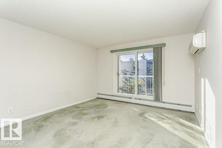 Property Photo:  #324 4210 139 Av NW  AB T5Y 2W6 