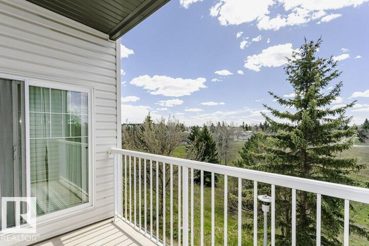 Property Photo:  16807 100 Avenue NW 323  AB T5P 4Z6 