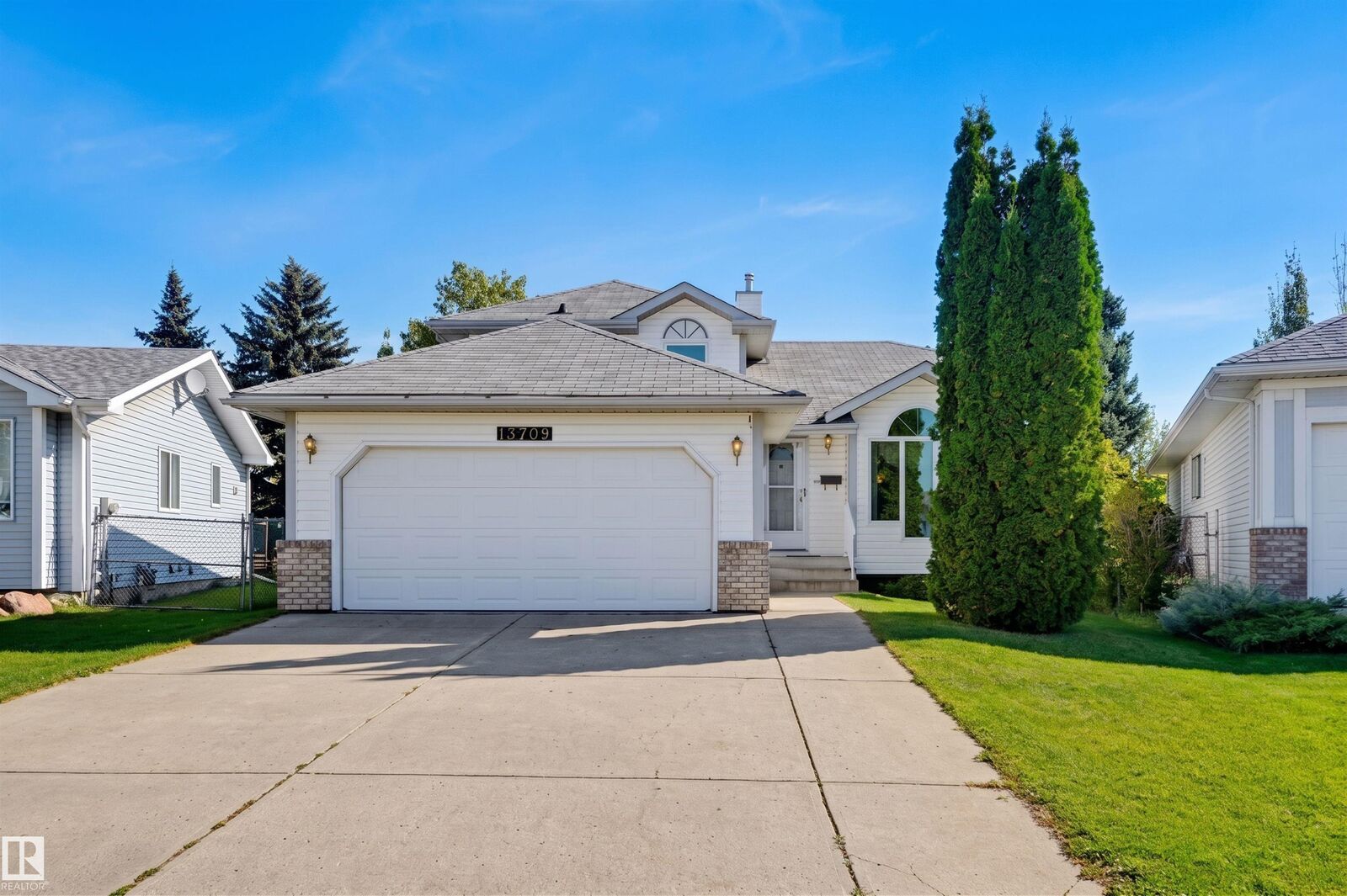 Property Photo:  13709 131 Avenue NW  AB T5L 5A3 