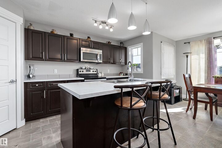 Property Photo:  7 Sandalwood Place  AB T9E 1C2 